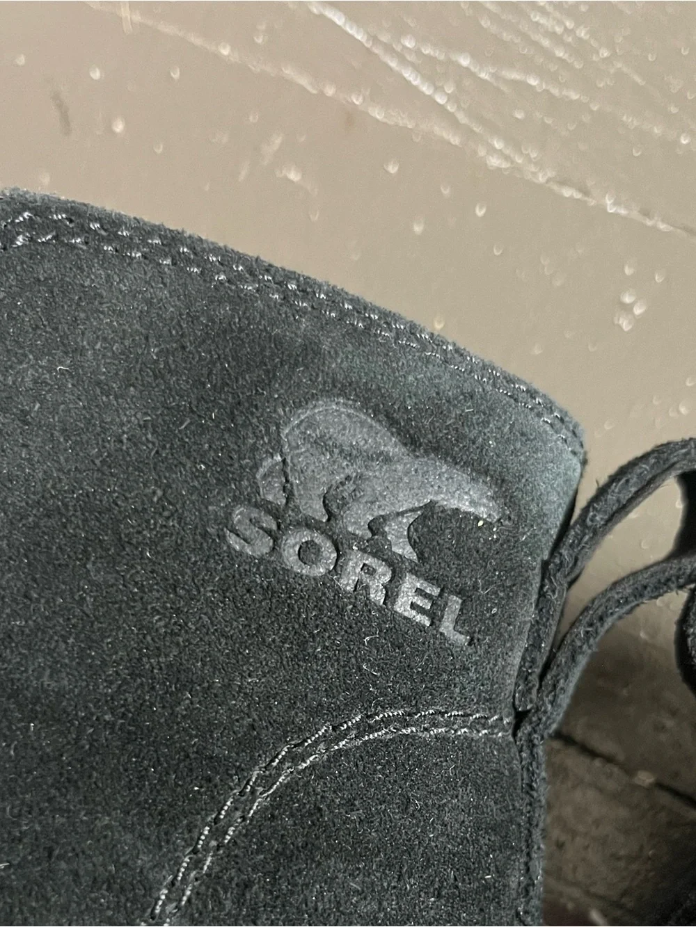 Sorel Evie Black Leather Pull On Boots with Brown Lug Sole